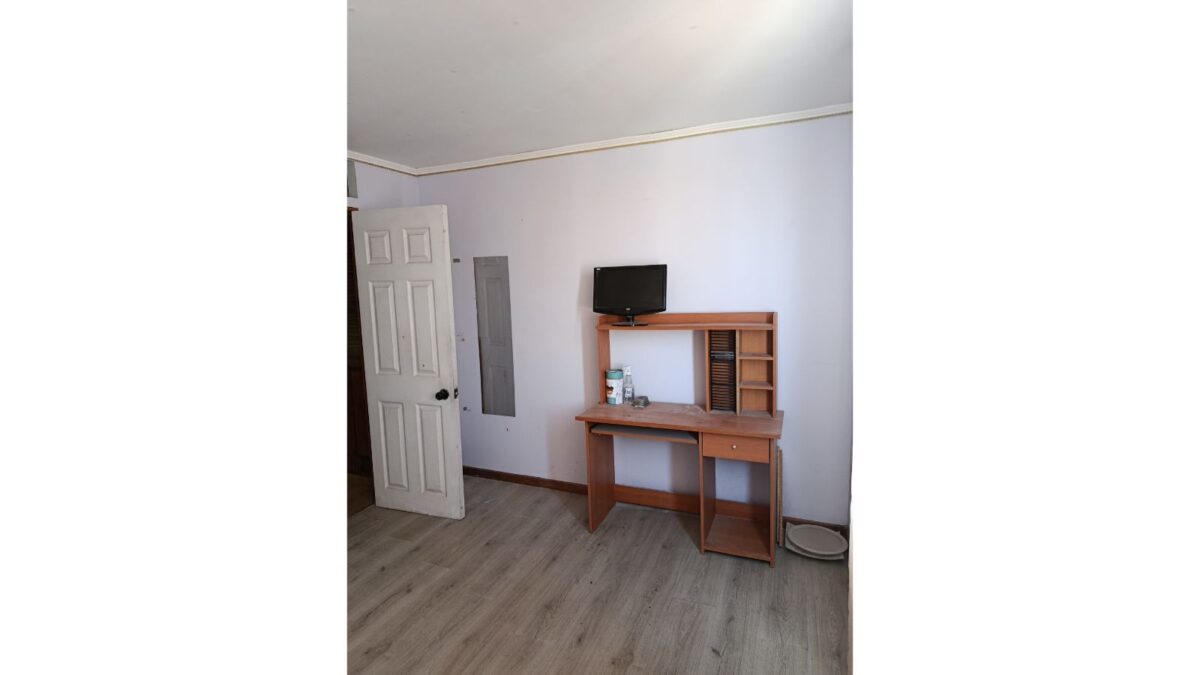 Dormitorio con escritorio y espacio de estudio, casa en venta en Alto Hospicio