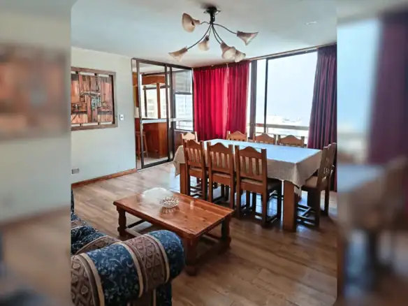Otra vista del living comedor con vista a la terraza cerrada, imagen referencial, departamento en Edificio Campanario III, Iquique